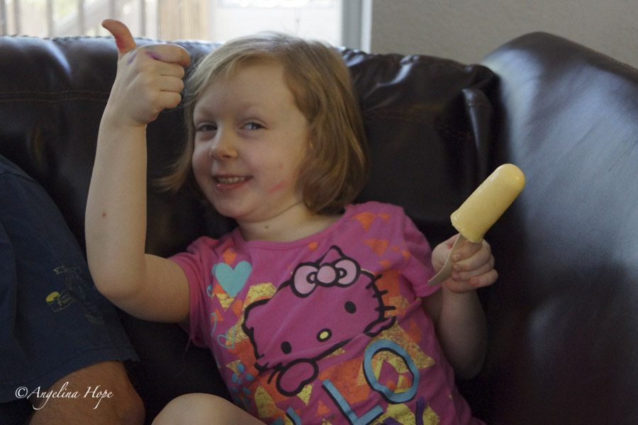 Mariella giving me her yummy thumbs up!