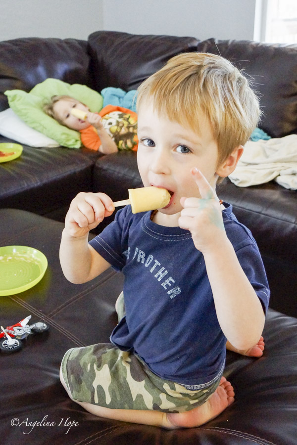 Joshua with his yummy thumbs up.. lol one day he is going to use his thumb, and I'll be sad. :D